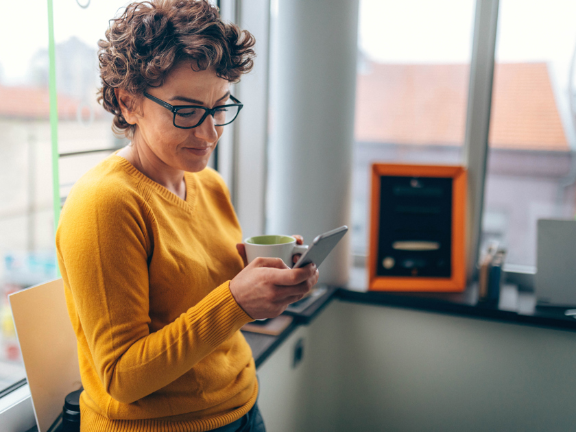 Woman Looking At Her Phone